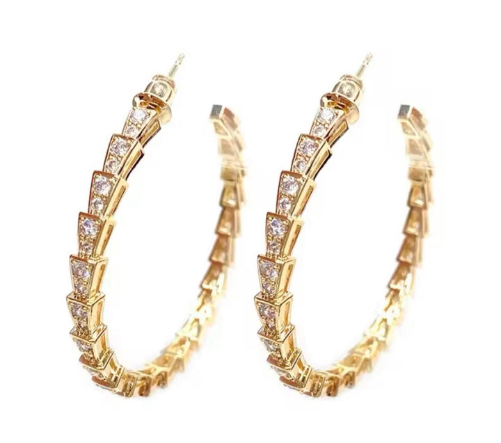 The Zurich Serpent Baguette Gold Earrings